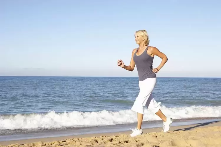 An aged woman jogging to lose weight and good heart function
